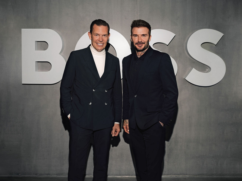 Daniel Grieder, CEO de Hugo Boss, con David Beckham